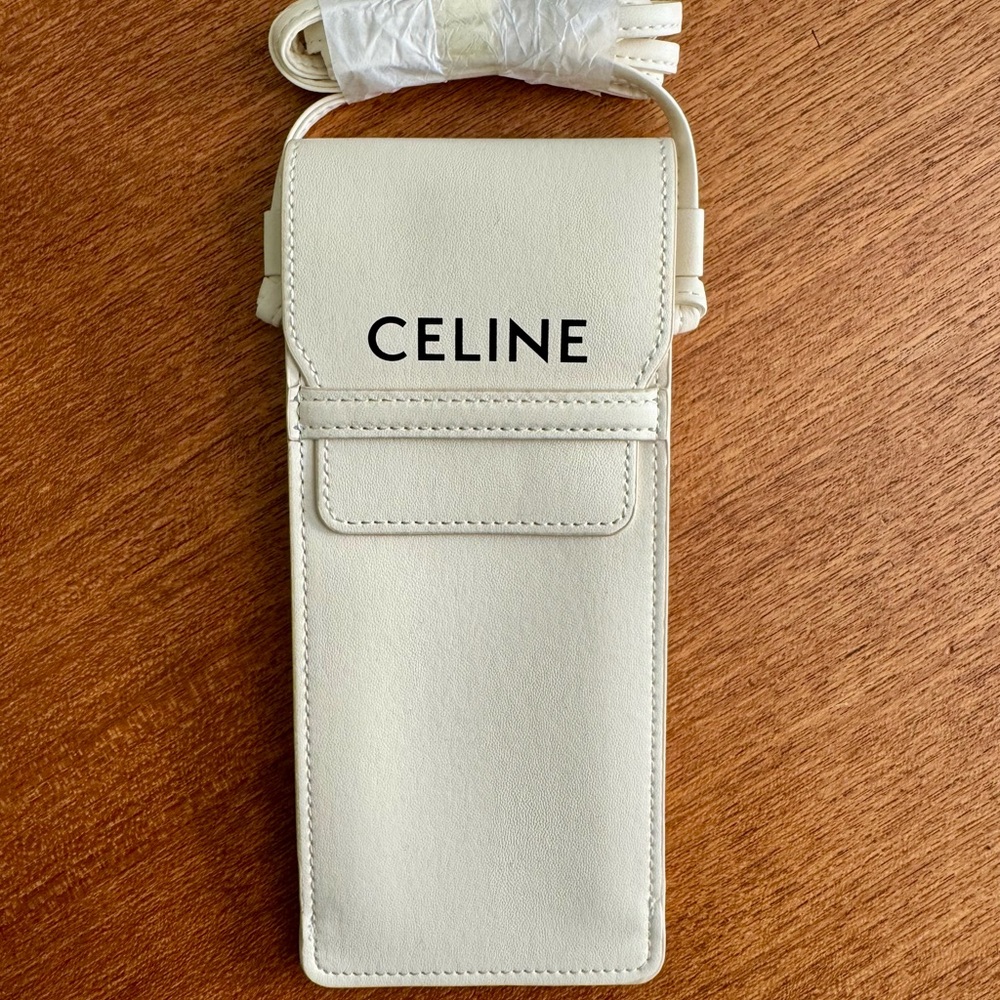 White leather Celine case with strap